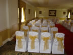 White Chair Cover with Gold Organza Sash